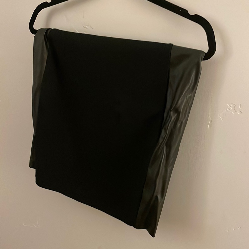 Black and leather mini skirt